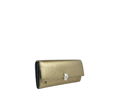 Shop Alexander Mcqueen Skull Motif Wallet In Gold