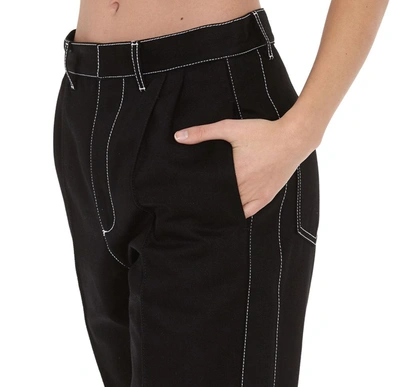 Shop Alexander Mcqueen Contrast Stitched Straight Pants In Black