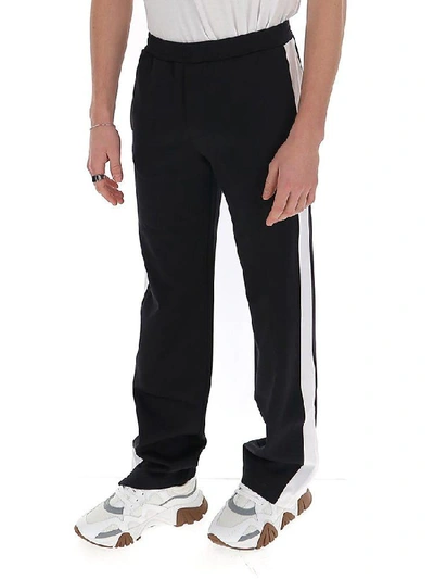Shop Valentino Vltn Stripe Detailed Track Pants In Black