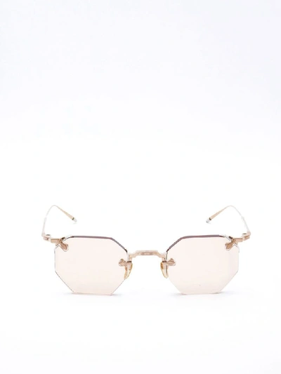 Shop Jacques Marie Mage Rimless Octagon Shaped Sunglasses In Gold