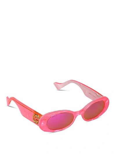 Shop Gucci Eyewear Oval Frame Sunglasses In Pink