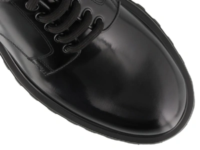 Shop Dolce & Gabbana Logo Embossed Derby Shoes In Black