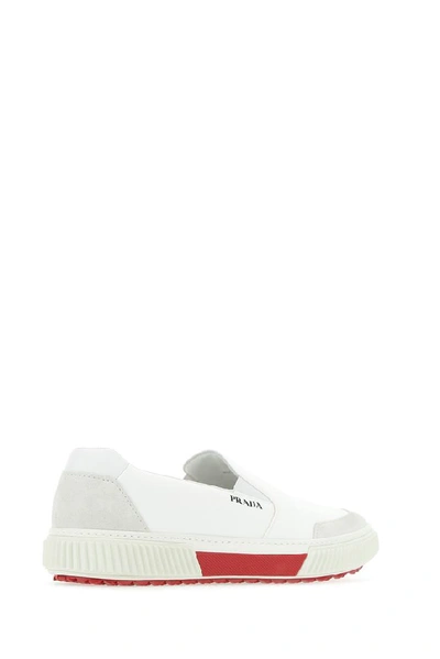 Shop Prada Logo Slip On Sneakers In White