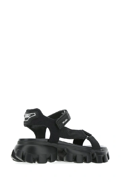 Shop Prada Cloudbust Sandals In Black