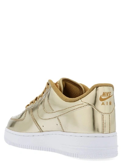 Shop Nike Air Force 1 Sneakers In Gold