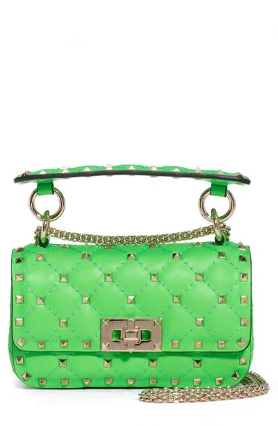 Shop Valentino Mini Spike It Rockstud Neon Leather Shoulder Bag In Green Fluo