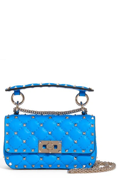 Shop Valentino Mini Spike It Rockstud Neon Leather Shoulder Bag In Azzurro Fluo