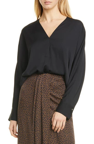 Shop Vince Stretch Silk Popover Blouse In Black