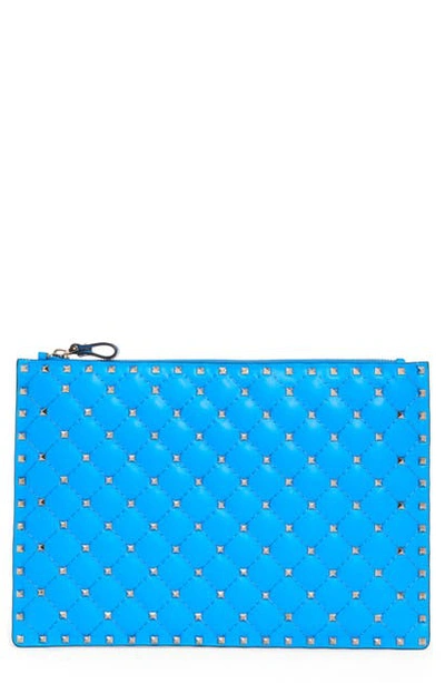 Shop Valentino Large Rockstud Spike Leather Flat Pouch In Azzurro Fluo