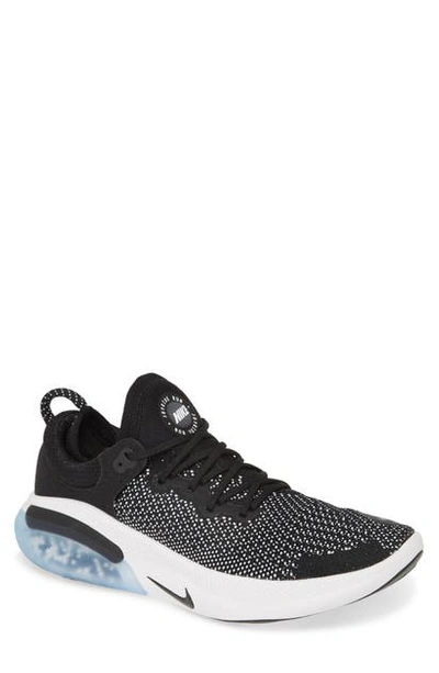 Shop Nike Joyride Run Flyknit Running Shoe In Black/ Black/ White