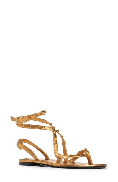 Shop Valentino Rockstud Ankle Strap Sandal In Deep Gold