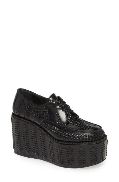 Shop Prada Woven Platform Loafer In Black