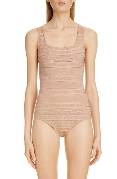 Shop Balmain Sheer Logo Stripe Jacquard Bodysuit In Beige Fonc