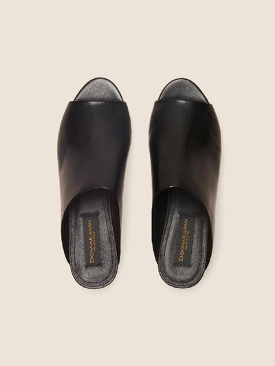 Shop Donna Karan Women's Reisley Leather Wedge Mule - In Black