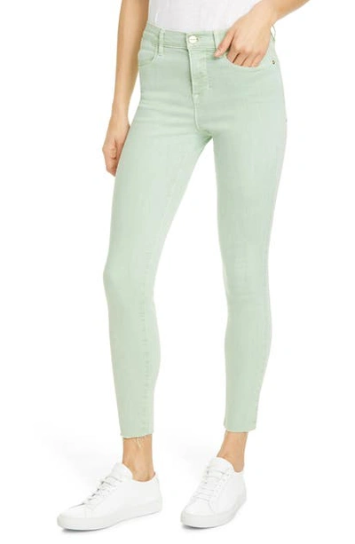 Shop Frame Le High Skinny Cloud Raw Edge Ankle Jeans In Aloe