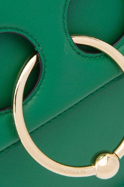 Shop Jw Anderson Medium Pierced Shoulder Bag In Green