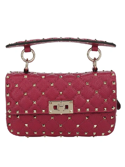 Shop Valentino Garavani Rockstud Zip Handbag In Red