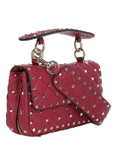 Shop Valentino Garavani Rockstud Zip Handbag In Red