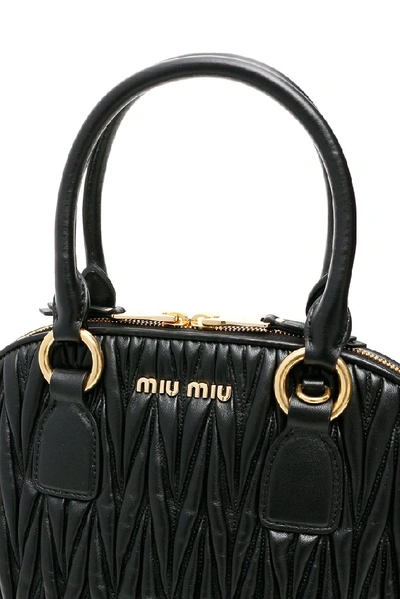 Shop Miu Miu Matelassé Logo Top Handle Tote Bag In Black