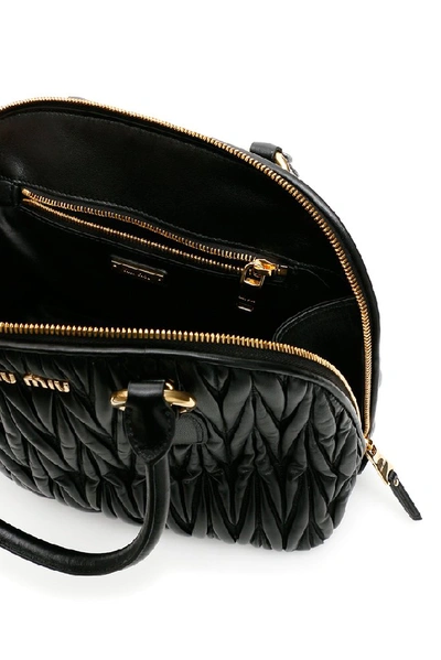 Shop Miu Miu Matelassé Logo Top Handle Tote Bag In Black