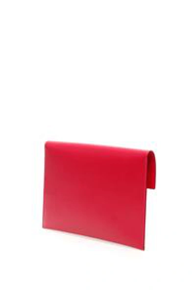 Shop Alexander Mcqueen Skull Embellished Envelope Pouch In Red