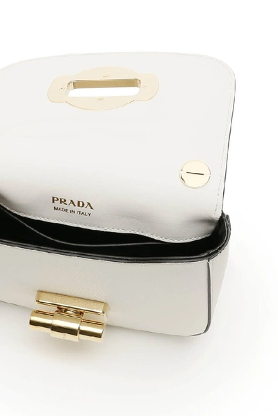 Shop Prada Lock Detail Shoulder Bag In White