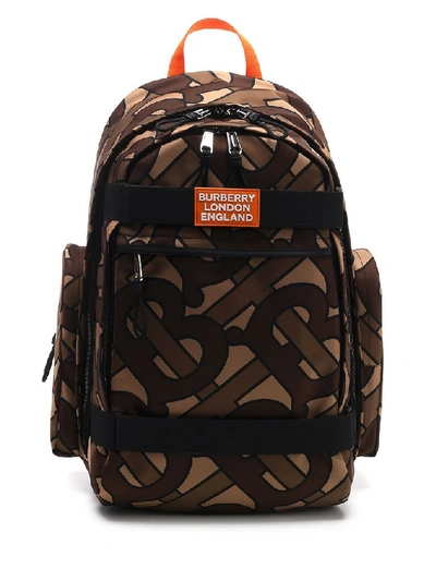 Shop Burberry All Over Monogram Print Backpack In Brown