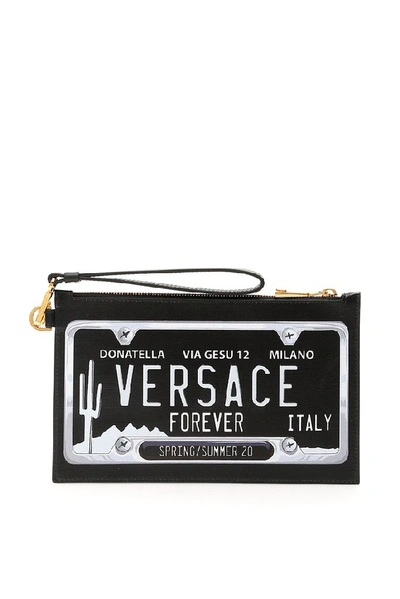 Shop Versace Logo Motif Clutch Bag In Black