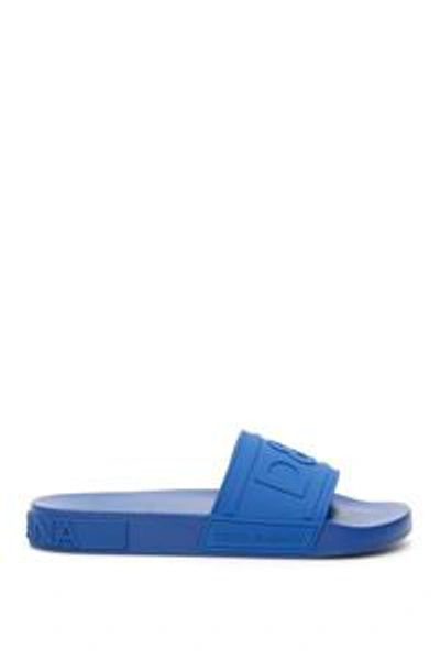 Shop Dolce & Gabbana Logo Embossed Slides In Blue