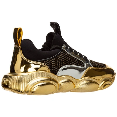 Shop Moschino Teddy Run Sneakers In Gold