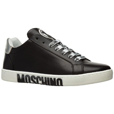 Shop Moschino Logo Motif Sneakers In Black