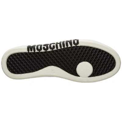 Shop Moschino Logo Motif Sneakers In Black