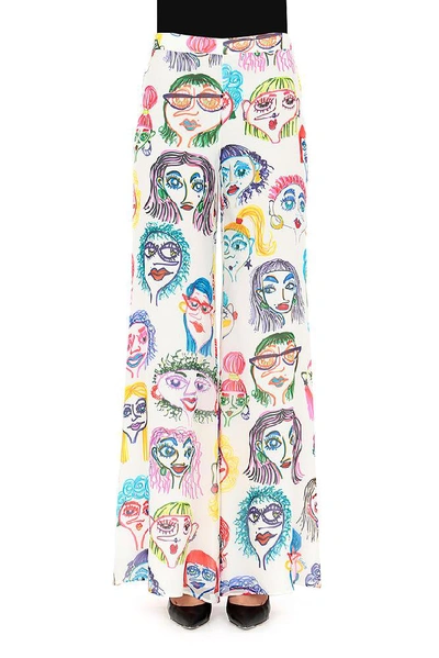 Shop Moschino Faces Printed Trousers In Multi