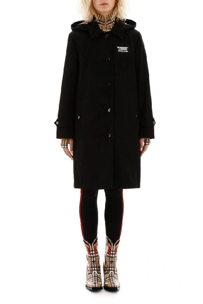 Shop Burberry Hooded Logo Coat In Black