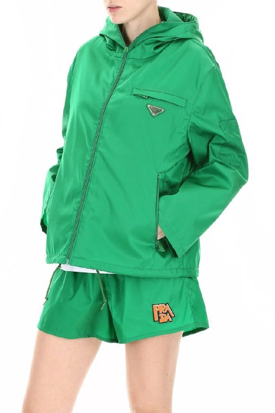 Shop Prada Hooded Logo Patch Jacket In Green
