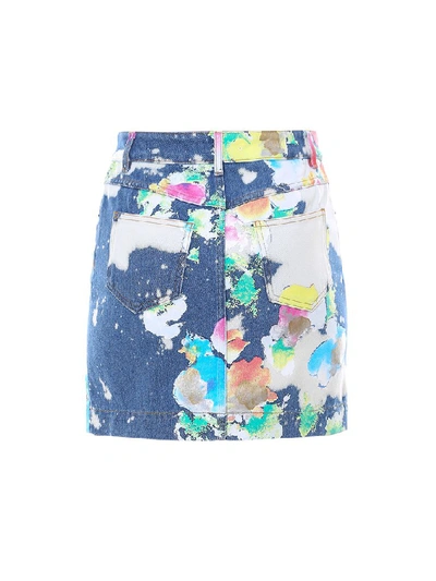 Shop Moschino Spray Paint Effect Denim Mini Skirt In Multi