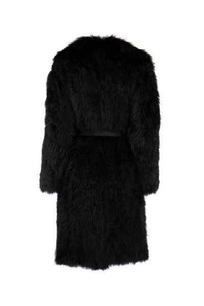 Shop Prada Belted Fur Coat In Black