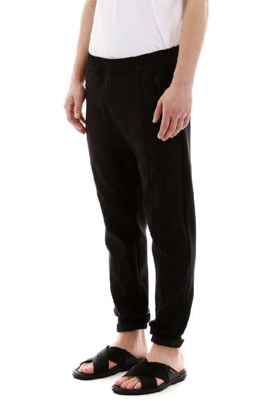 Shop Prada Logo Patch Track Pants In Black