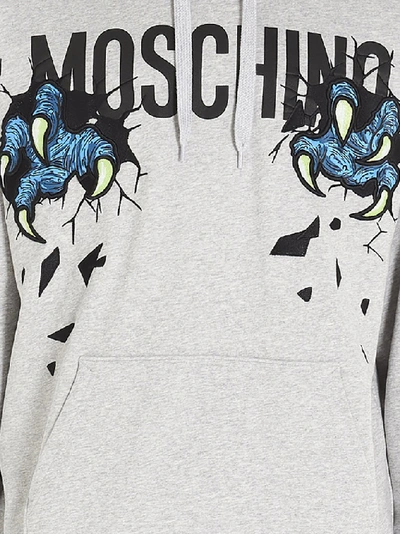 Shop Moschino Monster Hands Logo Print Hoodie In Grey