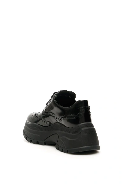 Shop Prada Patent Perforated Detail Logo Sneakers In Black