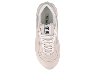 Shop Miu Miu Crystal Embellished Low Top Sneakers In Pink