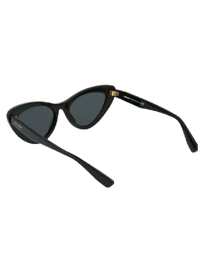 Shop Miu Miu Eyewear Cat Eye Frame Sunglasses In Black