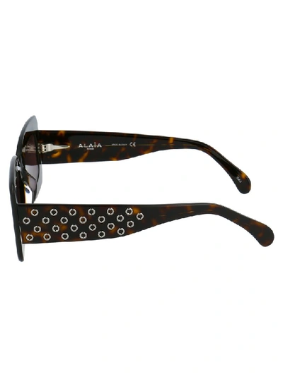 Shop Alaïa Square Frame Sunglasses In Brown