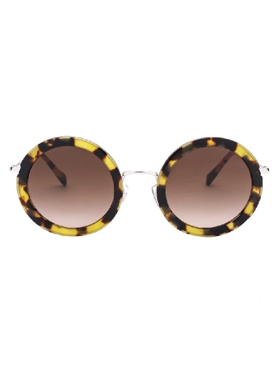 Shop Miu Miu Eyewear Round Frame Sunglasses In Brown