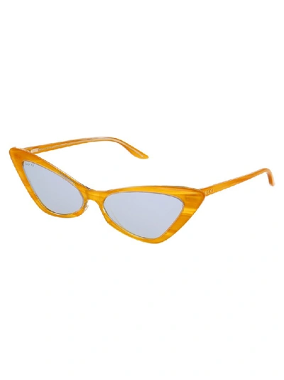 Shop Gucci Eyewear Cat Eye Frame Sunglasses In Yellow