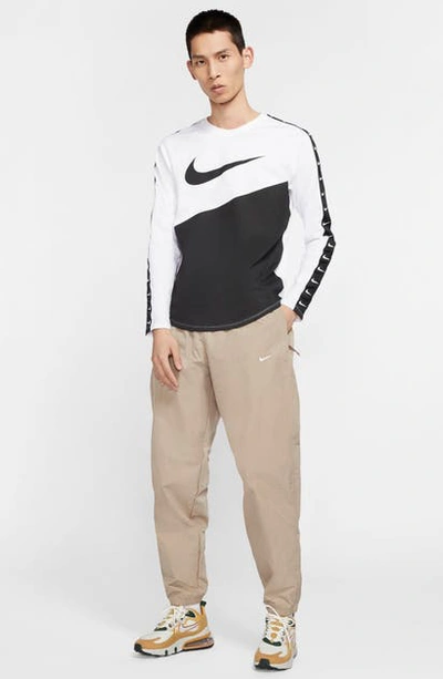 Shop Nike Lab Collection Nrg Nylon Track Pants In Khaki/ White