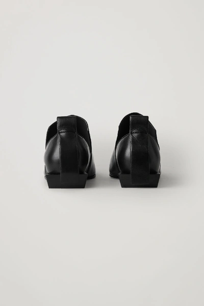 Shop Cos Pointed Leather Loafers In Black