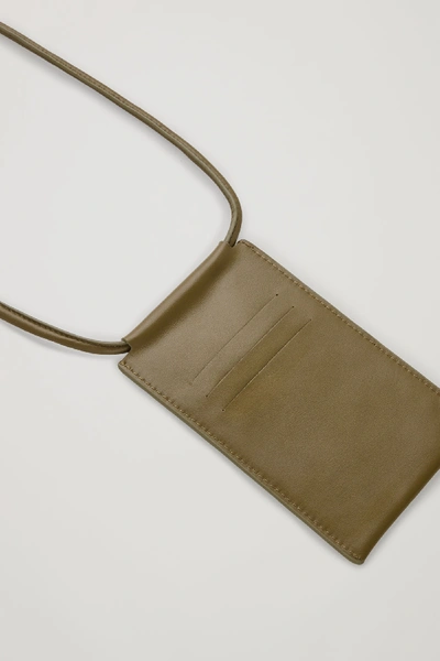 Shop Cos Leather Phone Pouch In Khaki Green