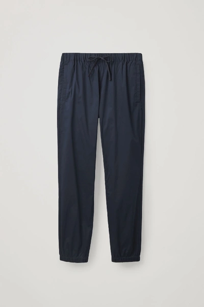 Shop Cos Relaxed-fit Cuffed Pants In Blue
