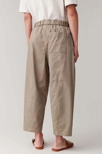 Shop Cos Elasticated Organic-cotton Pants In Brown